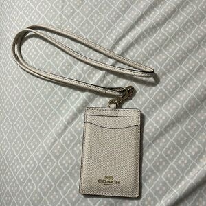 Coach card holder and neck chain